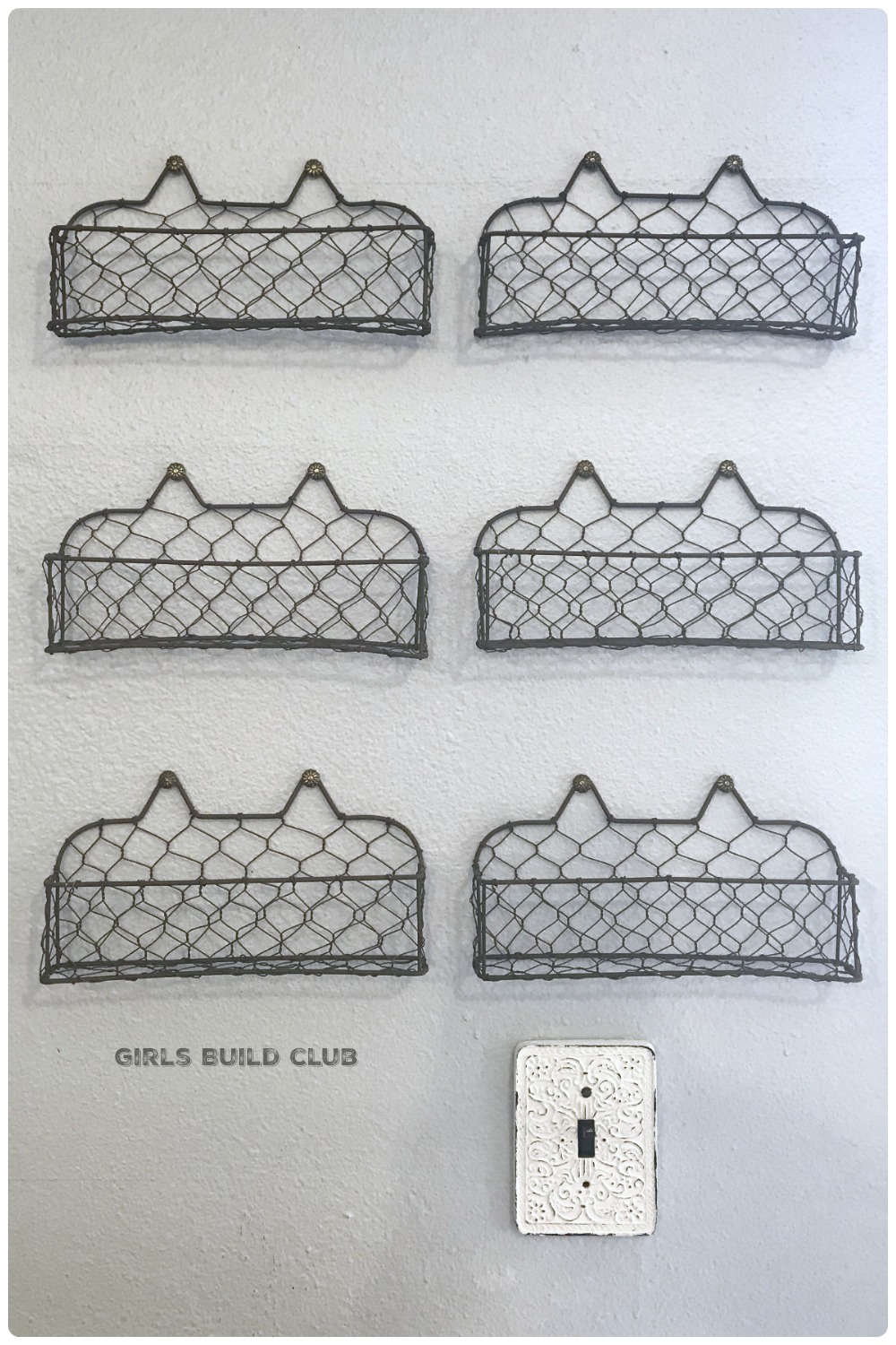 I just hung a bunch of these cute farmhouse wire baskets in my craft room and now they hold all my little bottles of craft paint! Love finding easy cheap ways to de-clutter!