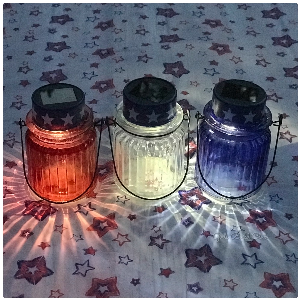 $2 Solar Lanterns for 4th of July! Easiest dollar store diy decor project ever. Just take apart the solar stake lights and glue to the top of these glass votives for an easy Fourth of July diy decor. #dollarstore #diycraft #4thofjuly 